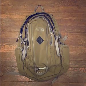 army green north face backpack